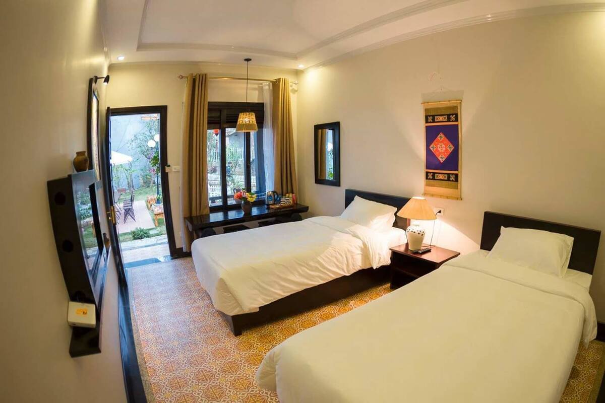 Superior Twin Room | Minibar, desk, laptop workspace, blackout drapes