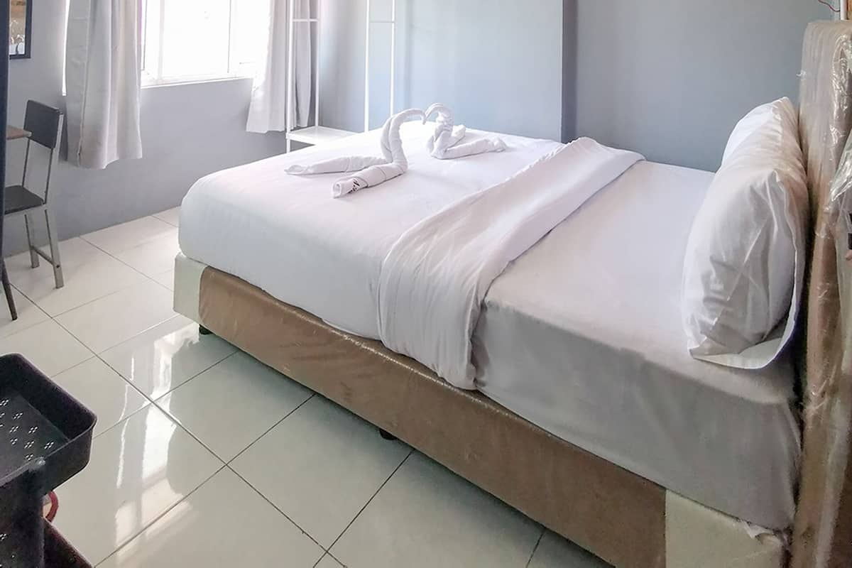 Deluxe-huone | Ylelliset vuodevaatteet, kannettavalle tietokoneelle sopiva työtila