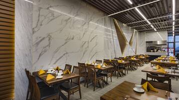 Breakfast, lunch, dinner served; local and international cuisine