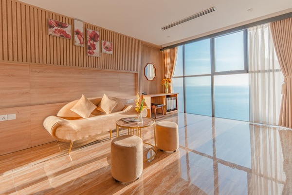 Suite, Ocean View | Living area | 23-inch flat-screen TV with cable channels, TV