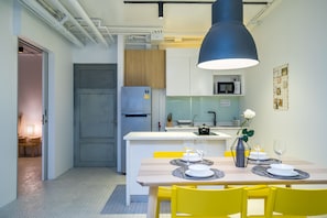 Two Bedrooms Apartment | Private kitchen | Fridge, microwave, stovetop, electric kettle