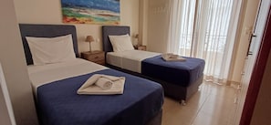 Comfort Apartment, 3 Bedrooms, Sea View | 3 bedrooms, individually decorated, individually furnished, desk