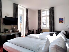 Family Quadruple Room, Non Smoking, Balcony | Minibar, individually decorated, individually furnished, desk