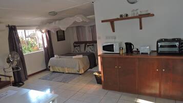 Basic Cottage, 1 Double Bed, Pool Access | Living area | TV