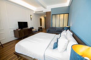 Deluxe Double or Twin Room, City View | Minibar, in-room safe, individually decorated, desk