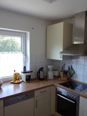 Apartment, Non Smoking | Private kitchen | Fridge, microwave, oven, stovetop - Strandleben 4 (Groemitz)