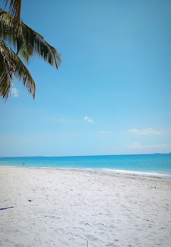 Private beach, white sand, beach massages