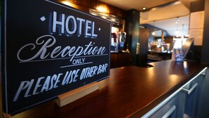 A sign in a hotel reception area indicating it is the hotel reception only and to use other bars. - Boundary, Alfreton by Marston's Inns (Alfreton)