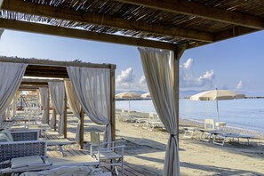 Private beach, sun loungers, beach umbrellas, beach towels
