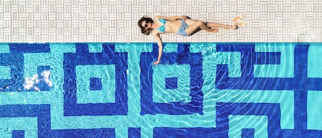 Outdoor pool, open 8:00 AM to 10:00 PM, pool umbrellas, pool loungers