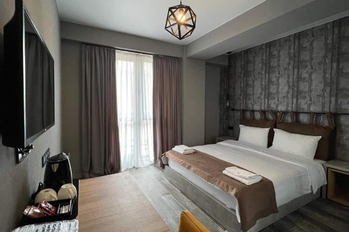 Habitación individual estándar | Ropa de cama de alta calidad y caja de seguridad en la habitación