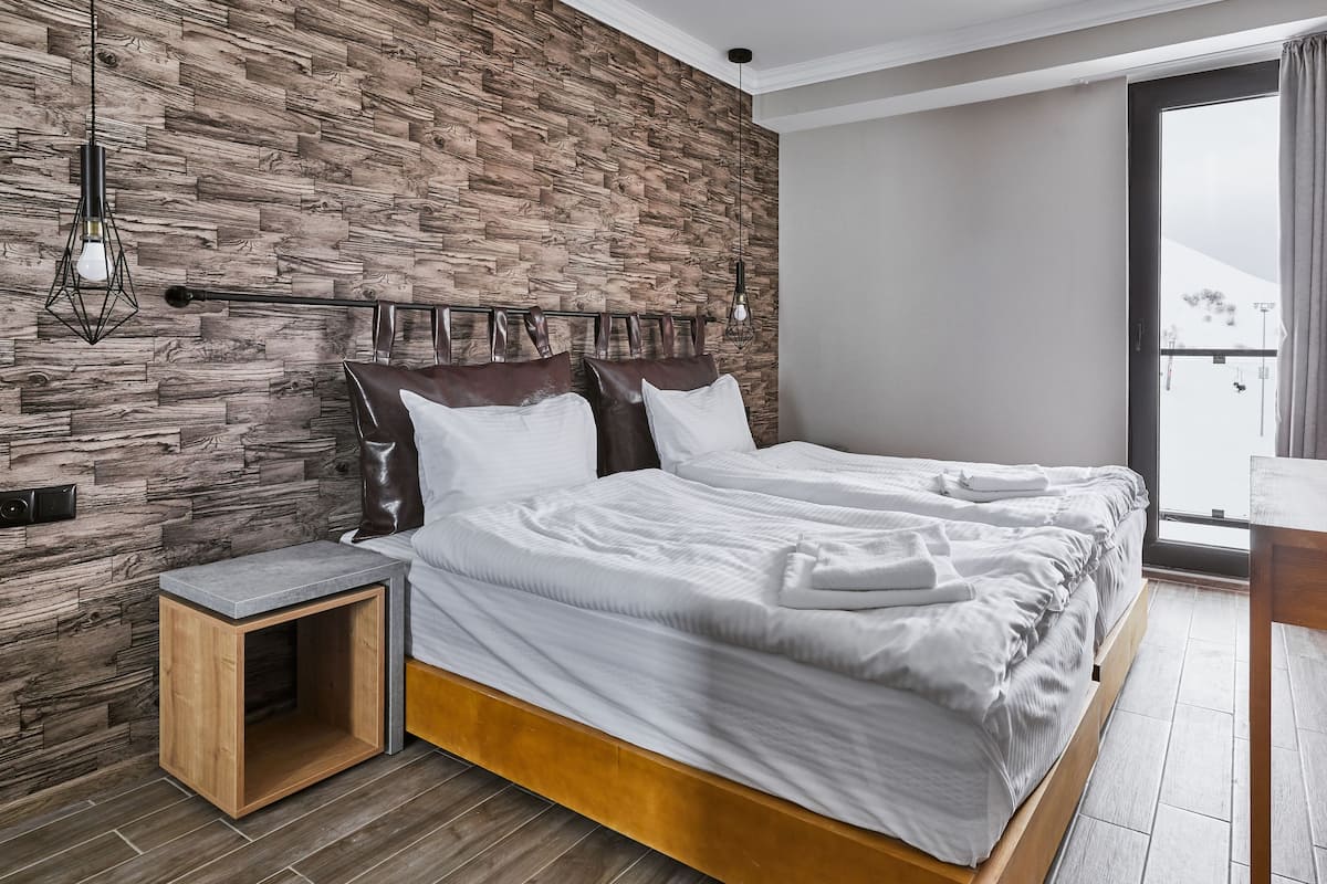 1 chambre, literie de qualité supérieure, couette en duvet d'oie