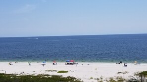 On the beach, sun-loungers, beach towels