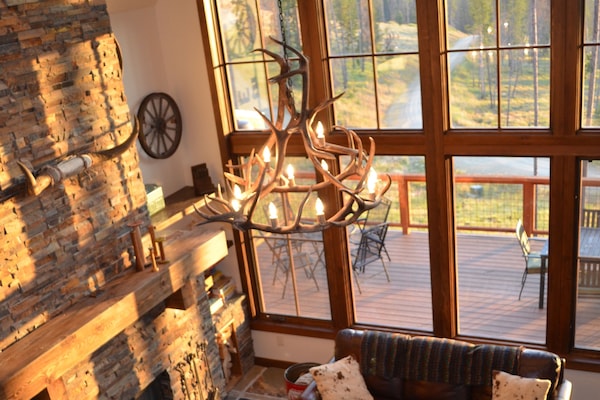 Enjoy the fire and the view, or play a board game around the big coffee table.