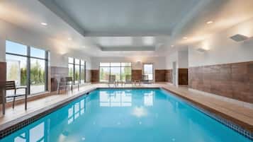 Indoor pool, open 7:00 AM to 10:00 PM, pool loungers