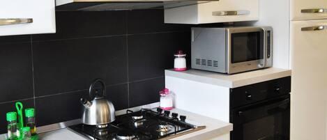 Fridge, microwave, oven, stovetop