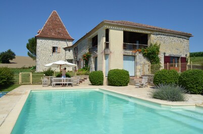 Restored 18th century farmhouse with swimming pool and tennis court. Large view.