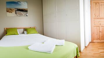Standard Apartment | Blackout drapes, iron/ironing board, free WiFi, bed sheets