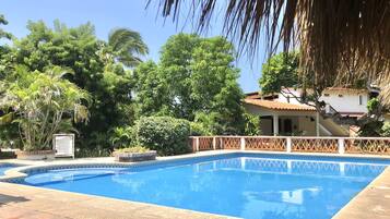 Outdoor pool, open 7:30 AM to 10:00 PM, sun loungers