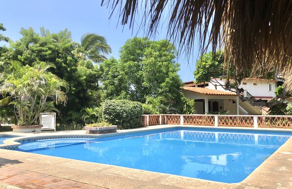 Outdoor pool, open 7:30 AM to 10:00 PM, sun loungers