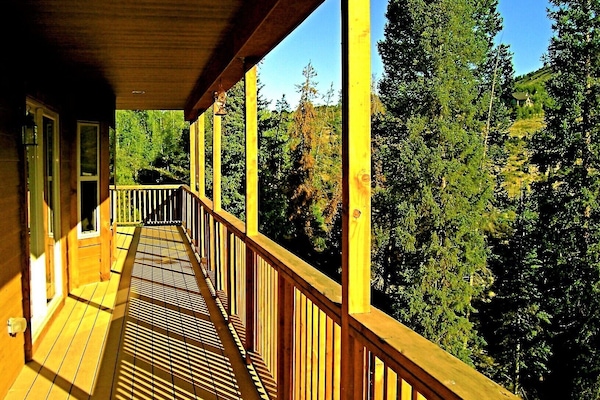 Covered Deck with mountain views and natural gas grill.