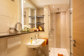Shower, rainfall showerhead, eco-friendly toiletries, hair dryer