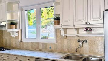 Apartment, 2 Bedrooms, Sea View | Private kitchen | Full-sized fridge, microwave, oven, stovetop