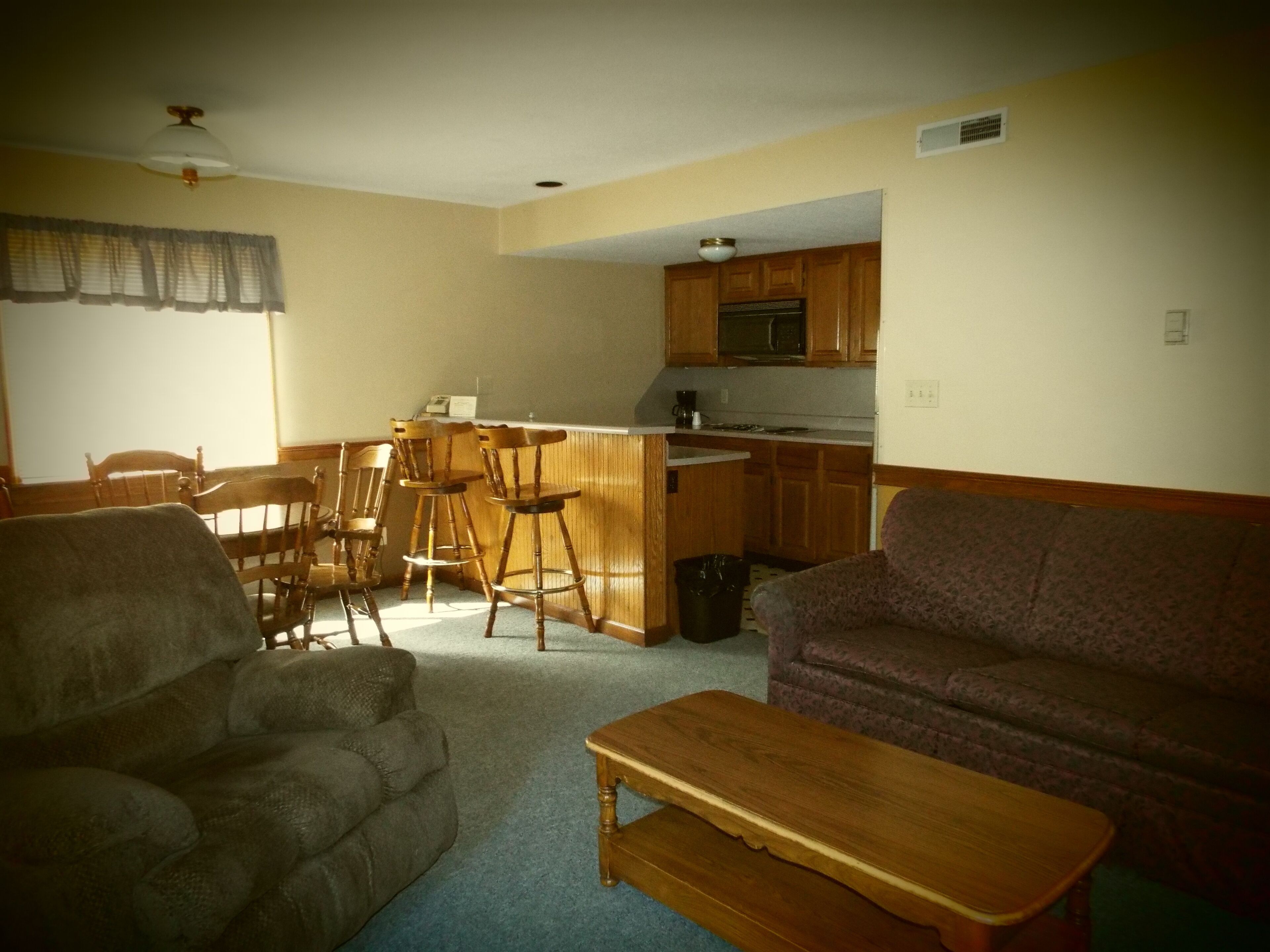 one bed suite | living area | 32-inch flat-screen tv with cable channels, tv