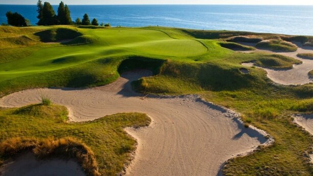 A golf course with sand bunkers and a view of the ocean. - SUMMER SPECIAL!! Ski, Golf and Fish Haus. 8 Beds, Fireplace, Rivers & Lakes (Thompsonville)