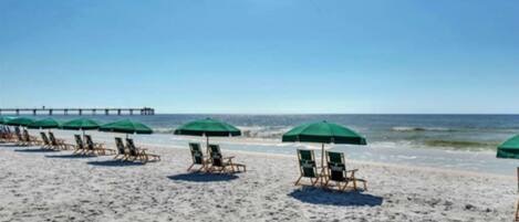 On the beach, sun loungers