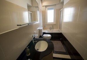 Hair dryer, towels, toilet paper