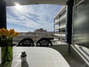 Enjoy a romantic meal for two on this balcony overlooking the city.