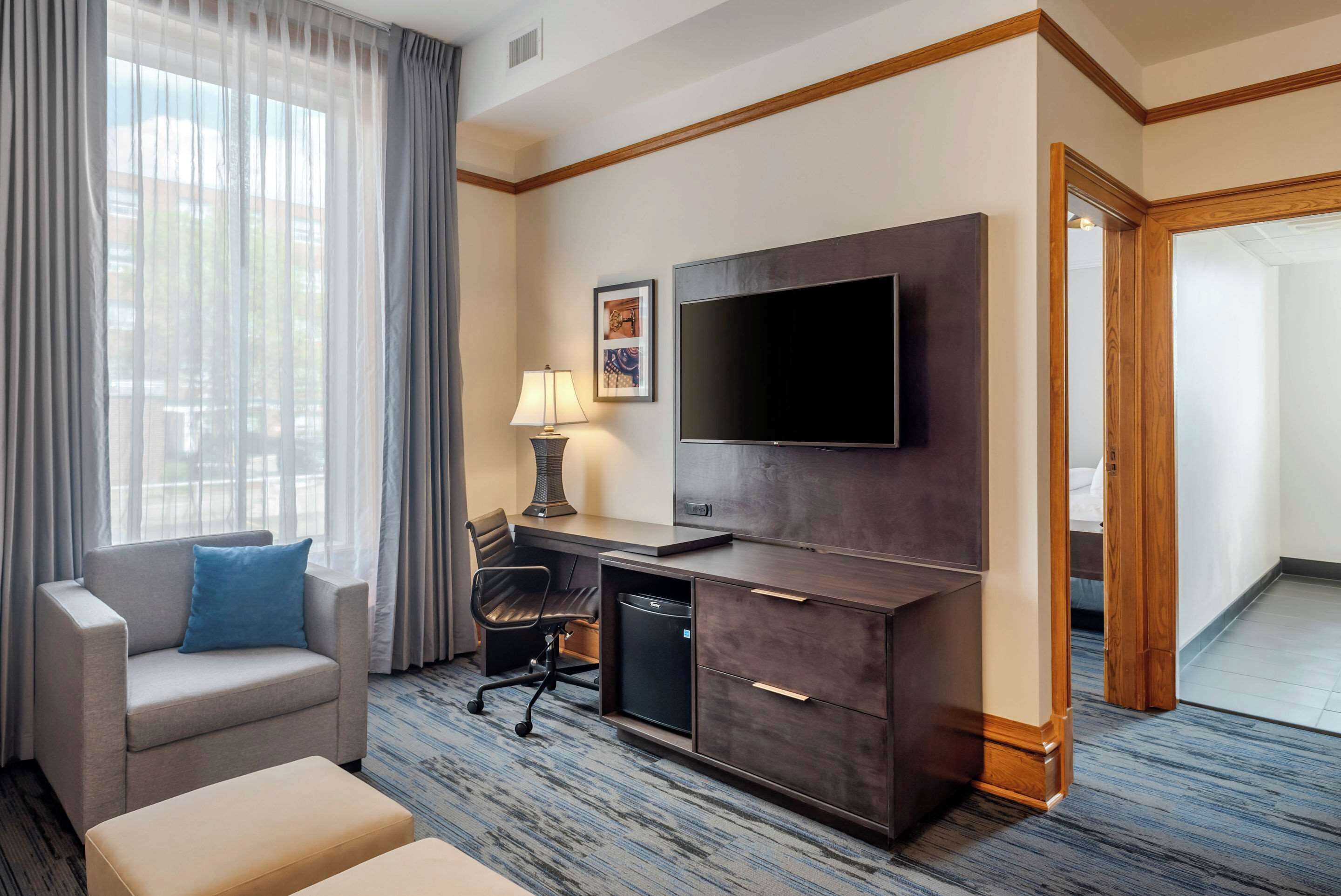 suite, 1 bedroom, non smoking | desk, blackout curtains, iron/ironing board, cots/infant beds