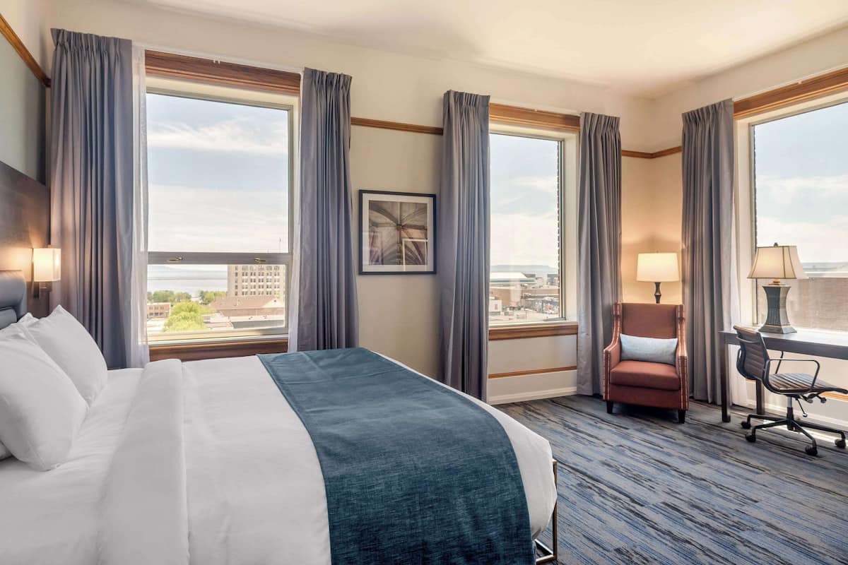 Superior Room, 1 King Bed, Partial View, Corner Room, Non Smoking | Desk, blackout drapes, iron/ironing board, cribs (surcharge)