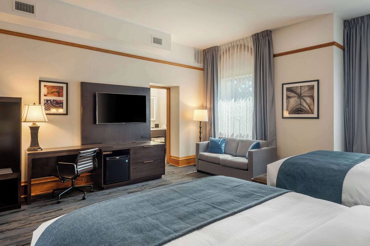 standard room, 2 queen beds, non smoking, lower levels | desk, blackout curtains, iron/ironing board, cots/infant beds