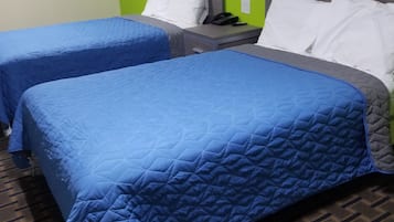 Economy Double Room, 2 Double Beds, Non Smoking | Individually decorated, individually furnished, desk, soundproofing