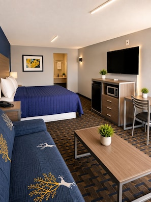 Economy Single Room, 1 King Bed, Non Smoking | Individually decorated, individually furnished, desk, soundproofing - AmeriStay Inn &Suites (Orange)
