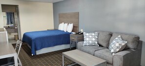 Economy Single Room, 1 King Bed, Non Smoking | Individually decorated, individually furnished, desk, soundproofing - AmeriStay Inn &Suites (Orange)