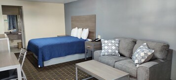 Economy Single Room, 1 King Bed, Non Smoking | Individually decorated, individually furnished, desk, soundproofing