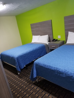 Economy Double Room, 2 Double Beds, Non Smoking | Individually decorated, individually furnished, desk, soundproofing - AmeriStay Inn &Suites (Orange)