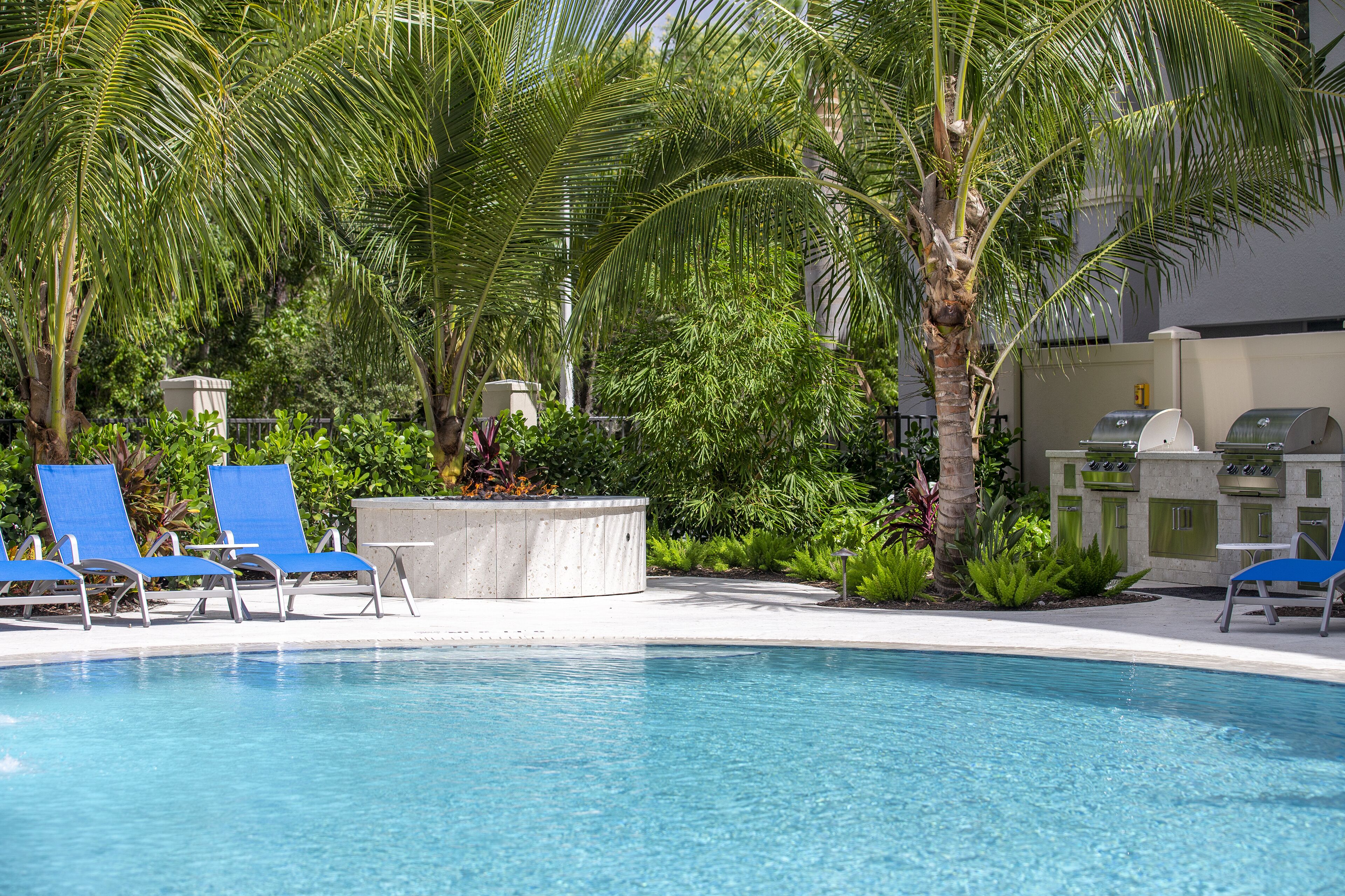 outdoor pool, pool umbrellas, pool loungers