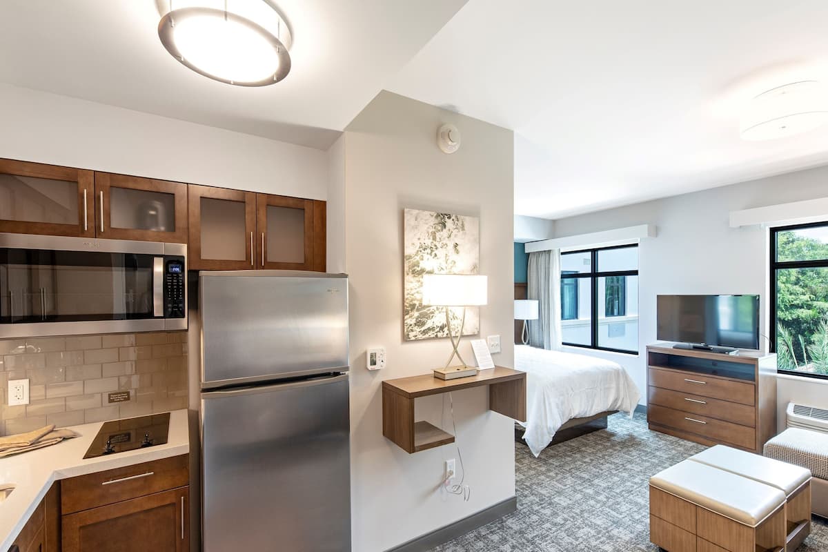 studio suite, 1 queen bed with sofa bed, kitchen | 1 bedroom, premium bedding, individually furnished, desk