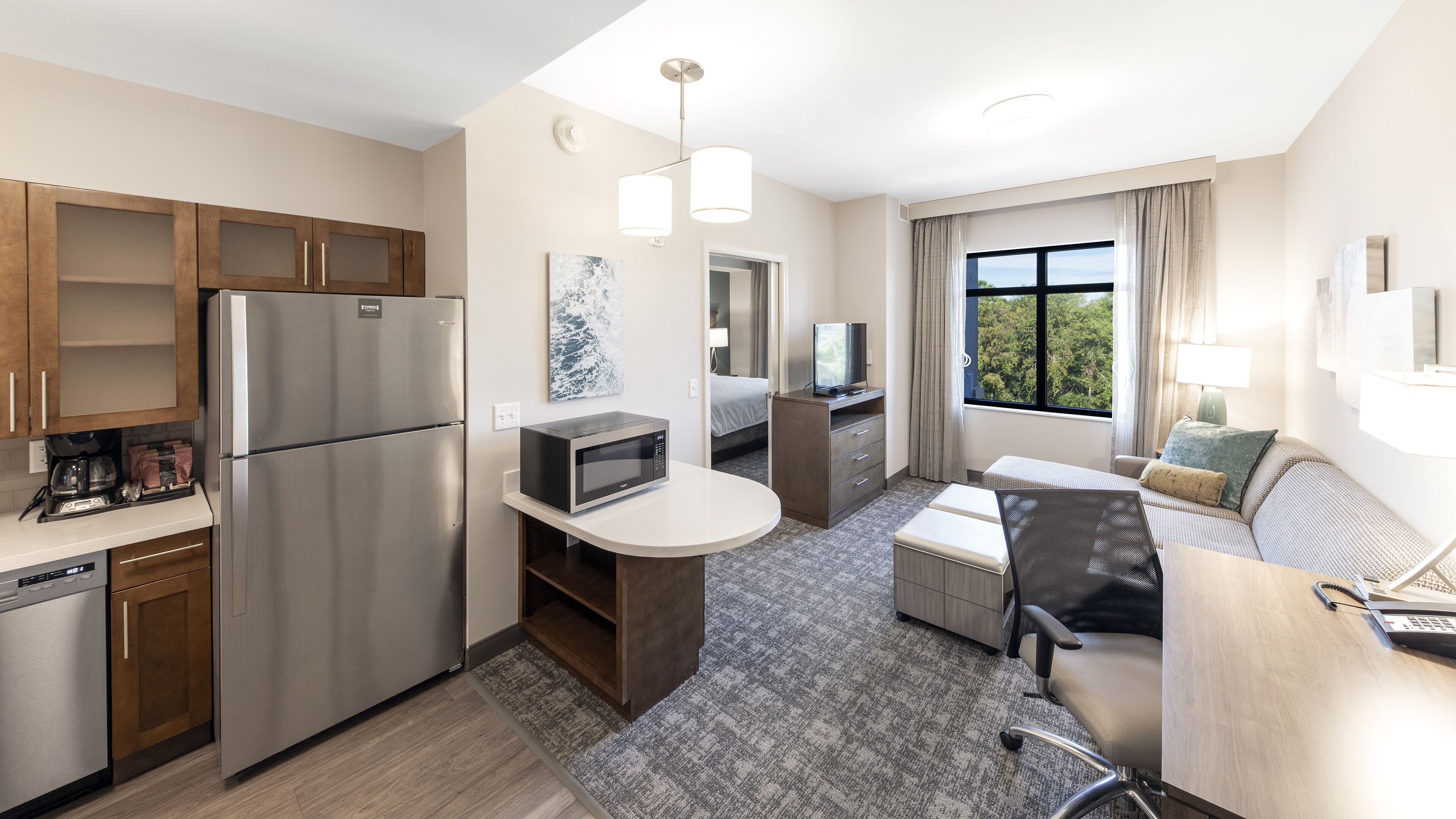 Suite, 1 Bedroom, Kitchen, Pool View | Premium bedding, desk, laptop workspace, blackout drapes