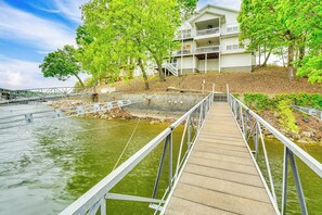 Enjoy scenic views from the balcony overlooking the tranquil waterfront.