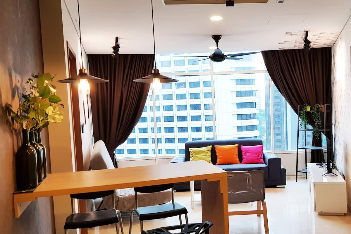 Premium Apartment, 3 Bedrooms | Living room | Flat-screen TV
