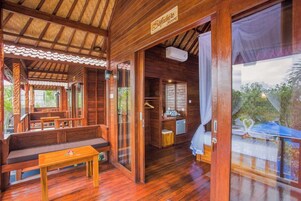 Deluxe Room, Pool View | 1 bedroom, minibar, blackout drapes, free WiFi