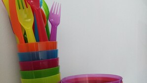 A stack of colorful plastic bowls and utensils. - RJB at Ayodhya Tangerang (Tangerang)
