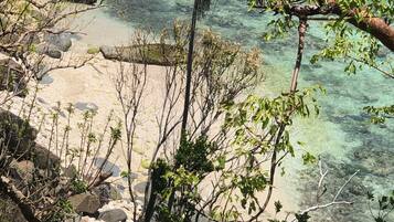 On the beach, sun loungers, beach towels