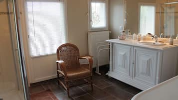 Combined shower/tub, hair dryer, towels, toilet paper