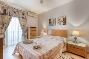 2 bedrooms, desk, iron/ironing board, travel crib